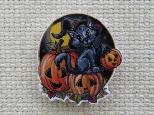 Black Cat Sitting on Carved Pumpkins Needle Minder, Cover Minder, Magnet